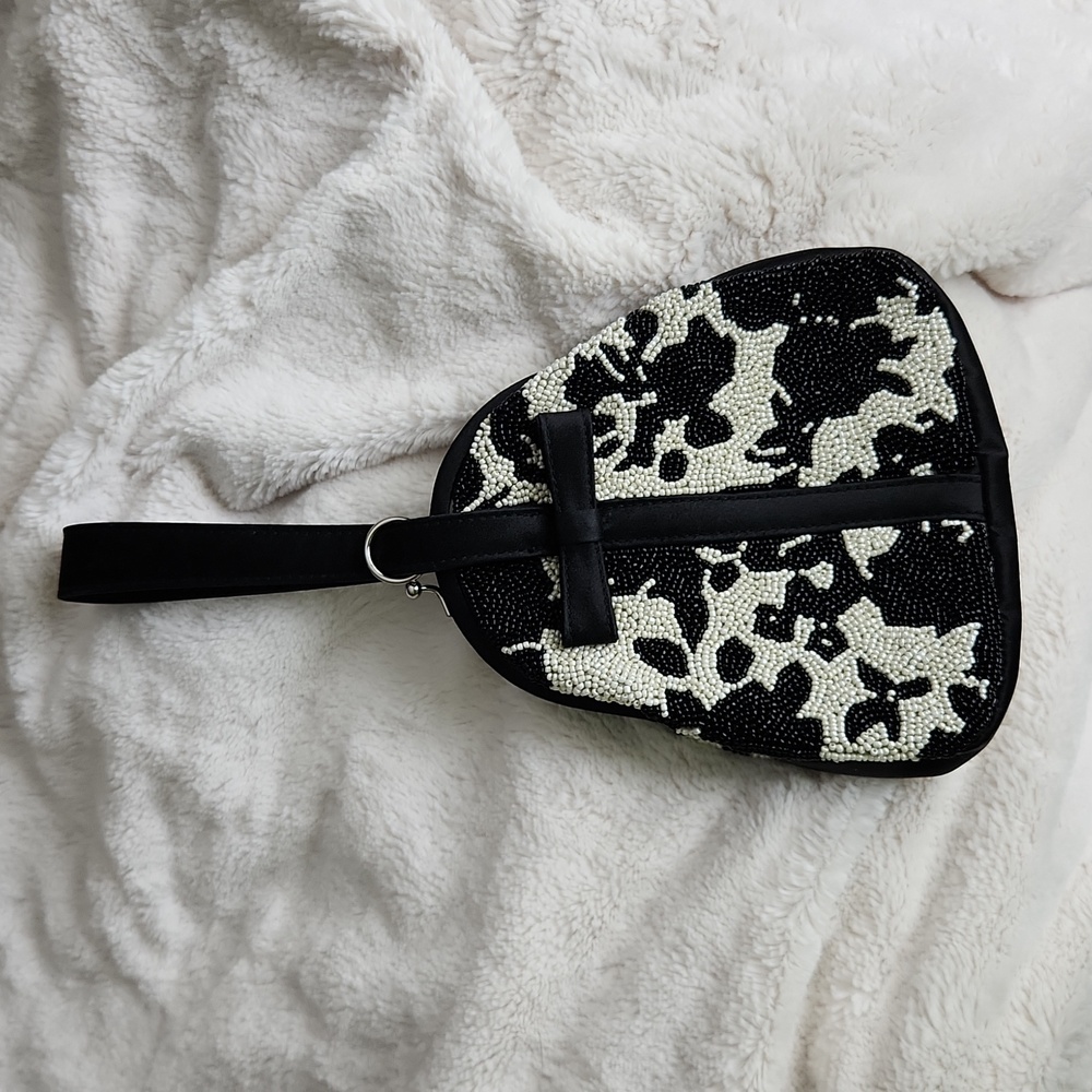 Evening bag.  Beautiful beaded wristlet with satin bow, band and trim.